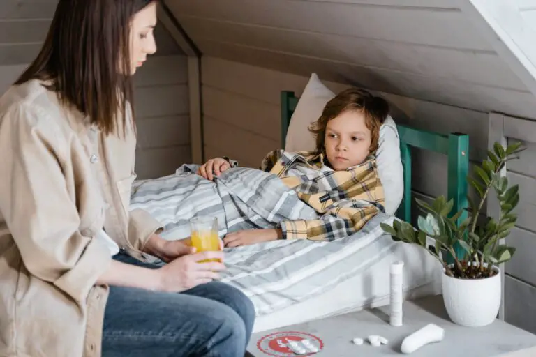 Bed bug rash treatment - Mother sitting beside sick child