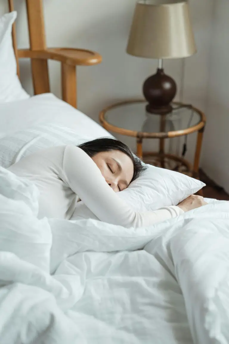 Prevent bed bugs - Young woman sleeping in comfy bed